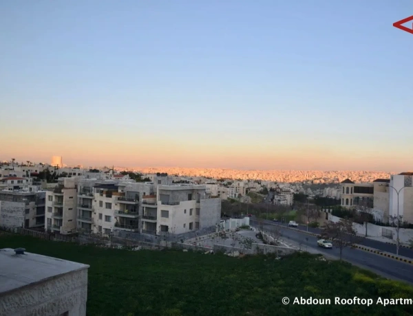 Elegant Two-Bedroom Apartment with Stunning Views and a Flower Garden Terrace – Abdoun