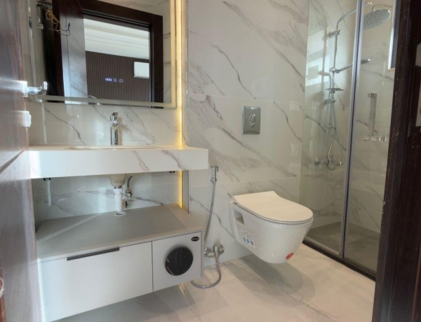 Luxury Top-Floor Apartment with Private Roof for Sale on Airport Road – Panoramic View