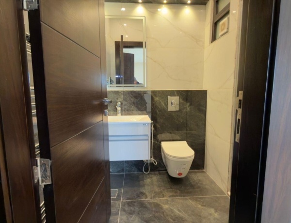 Luxury Top-Floor Apartment with Private Roof for Sale on Airport Road – Panoramic View