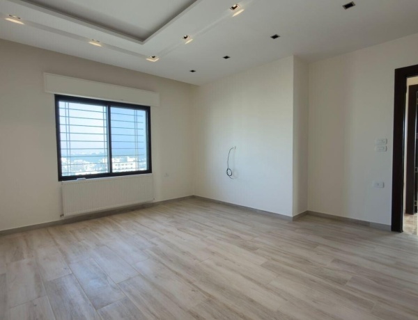 Luxury Ground-Floor Apartment for Sale with Panoramic Views – Airport Road, Amman