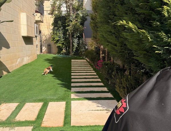 Modern 2-Bedroom Ground Floor Apartment with Garden & Pool in Abdoun near Australian Embassy