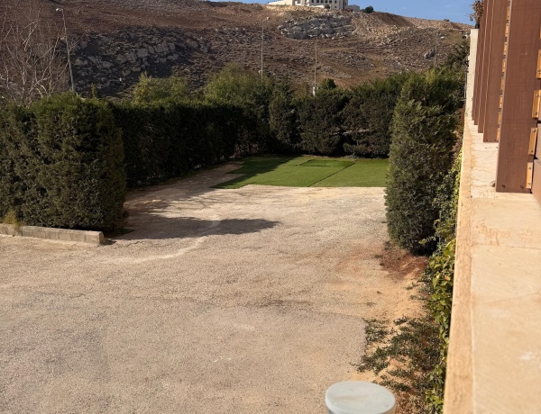 Modern 2-Bedroom Ground Floor Apartment with Garden & Pool in Abdoun near Australian Embassy