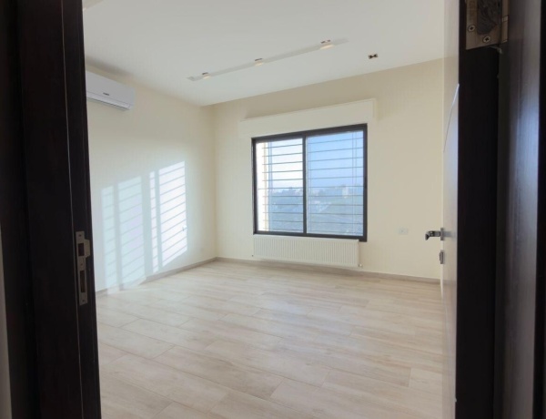 Luxury Ground-Floor Apartment for Sale with Panoramic Views – Airport Road, Amman
