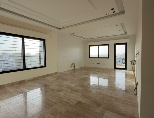 Luxury Top-Floor Apartment with Private Roof for Sale on Airport Road – Panoramic View