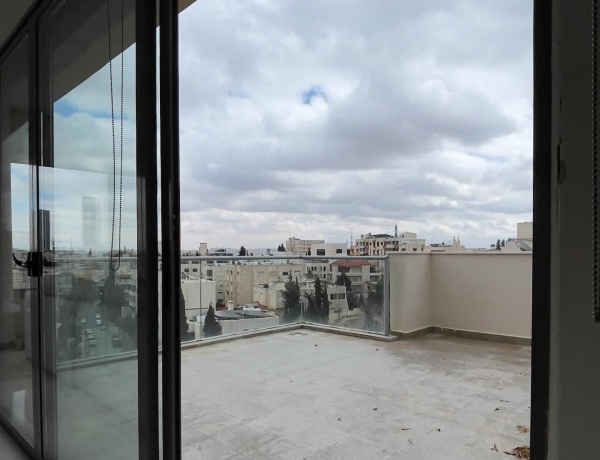 Spacious 4-Bedroom Rooftop Apartment with Huge Terrace in 4th Circle, Amman