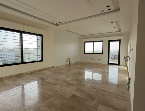 Luxury Top-Floor Apartment with Private Roof for Sale on Airport Road – Panoramic View