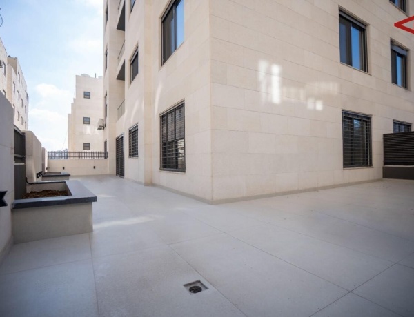 Spacious 2-Bedroom Apartment for Rent in Deir Ghbar – Ground Floor with Terrace, Parking & Elevator
