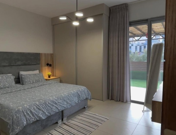Two-Bedroom Apartment with Private Garden for Rent in Jabal Amman – 4th Circle