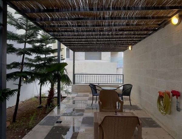 Two-Bedroom Apartment with Private Garden for Rent in Jabal Amman – 4th Circle