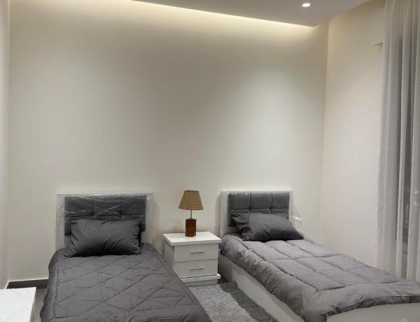 Spacious 2-Bedroom Apartment for Rent in Deir Ghbar – Ground Floor with Terrace, Parking & Elevator