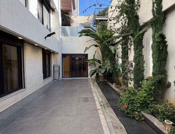 Luxury Three-Bedroom Apartment with Private Terrace for Rent in Abdoun, Amman