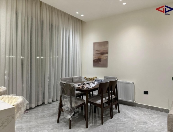 Spacious 2-Bedroom Apartment for Rent in Deir Ghbar – Ground Floor with Terrace, Parking & Elevator