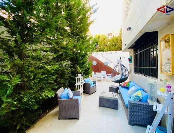2-Bedroom Apartment with Private Garden in Abdoun – Near Taj Mall